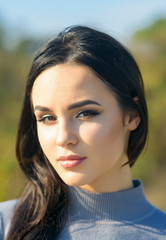 Fototapeta premium Girl with long brunette hair enjoy autumn nature