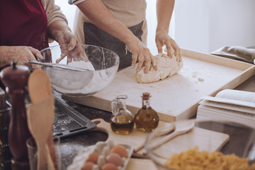 People making dough on board