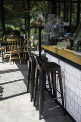 Village cafe with metal counter bar chairs