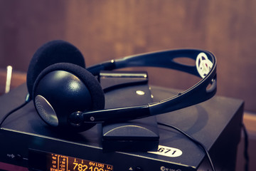 wireless multy language headphones set on the chairs in conference room