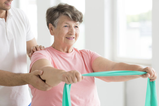Senior woman during individual rehabilitation - Powered by Adobe