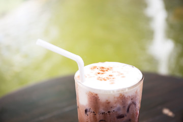 Iced chocolate on table