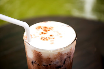 Iced chocolate on table