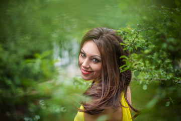 Wonderful girl in yellow dress, closeup. Creative portrait of girl