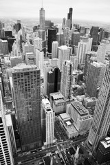 Urban city architecture background.Chicago skyline aerial view. An overhead view of the city of Chicago downtown taken from the John Hancock Center skyscraper. Vertical composition in black and white.