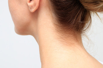 Nape of a young woman's neck - 180249270