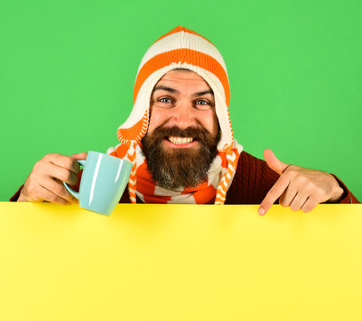 Powder mixture and hot beverages idea. Hipster with beard