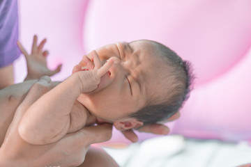 Fototapeta na wymiar Closeup asian baby cry