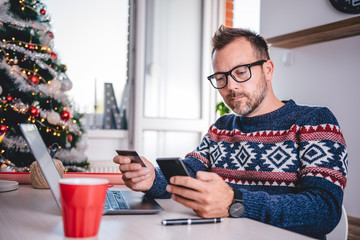 Men shopping online during christmas