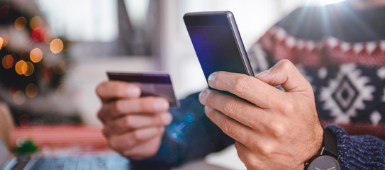 Men shopping online during christmas