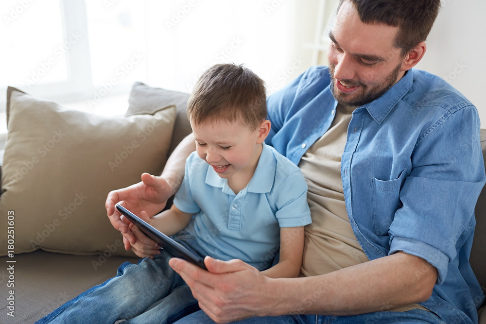 Sticker father and son with tablet pc playing at home