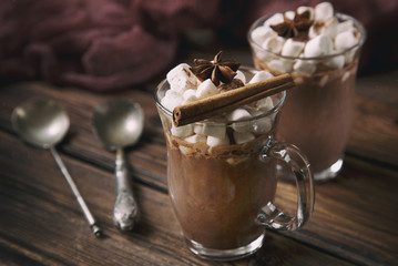 Hot chocolate with marshmallow in vintage style. Close-up, selective focus, shallow depth of field