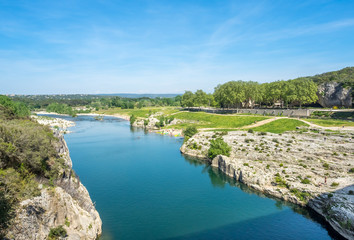 Fototapeta na wymiar Gardon river beneath Pont du Gard in France