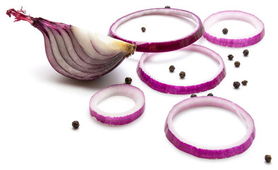 Sliced red onion rings, one quarter and black pepper, isolated on white background.