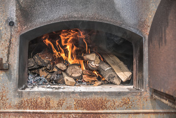 Bread in a traditional way, homemade, bake bread in wooden oven