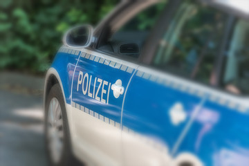 Obraz premium Exterior view of police car parked at street - Spot view