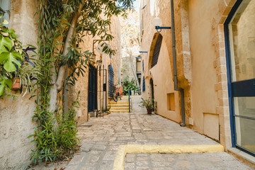 Fototapeta na wymiar Ancient street in Tel-Aviv Jaffo. Jaffa old urban architecture.