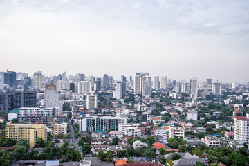 Fototapeta premium Sky view of city buildings with blue sky at Bangkok Thailand 