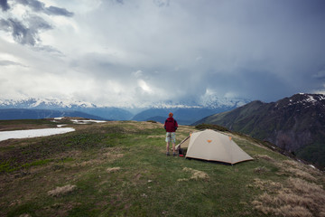 Traveler is watching the beginning of a thunderstorm