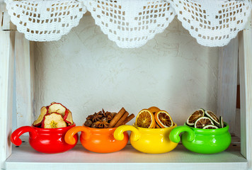 dried fruits in colored cups