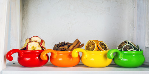 dried fruits in colored cups