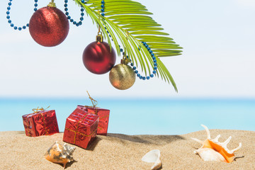 Christmas tree decorations on the beach in tropical