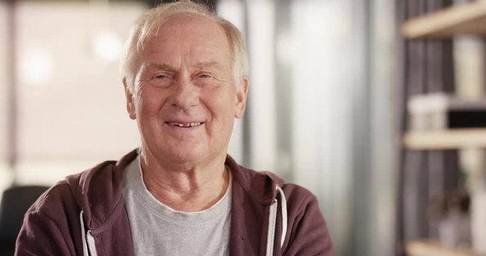 Happy Retiree smiling into Camera