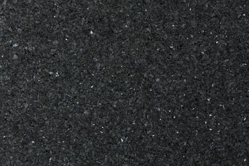Black granite texture. close up.