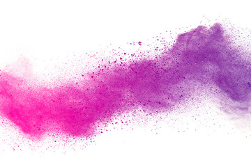 Freeze motion of colored powder explosions isolated on white background