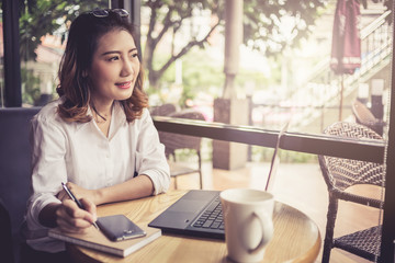 Fototapeta premium beautiful happiness asian girl speak with smartphone business communication ideas concept