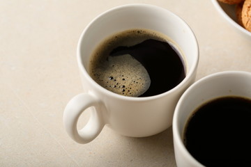 Coffee in white cup closeup