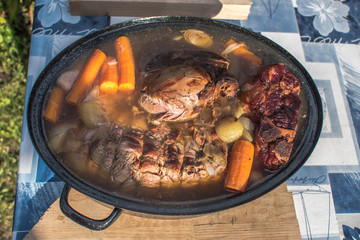 Several kinds of meat in the roasting rack and fried in the wood oven