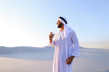 Breath of freshness of male Muslim in middle of dry climate of s