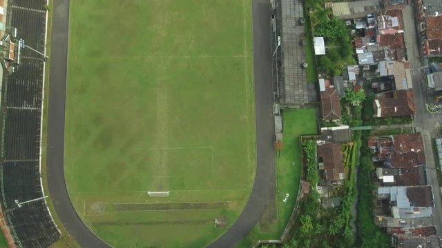 Great aerial shot over a futbol/soccer stadium in Colombia