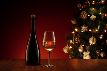 close up view of champagne bottle with flute  color back