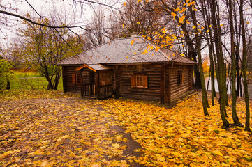 Wooden house shed in the historic Boldino Estate of the Russian poet Pushkin in the fall. Park...