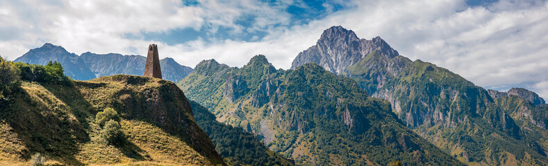 Georgia. An old watchtower on the background of the mountains