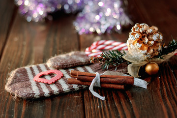 Christmas decoration - wool mitten with christmas accessories.