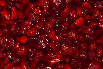 Background of fresh red cutted strawberry fruits
