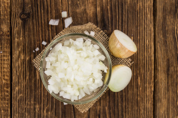 Fresh made Chopped white onions on a rustic background