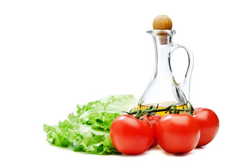 Tomato, lettuce salad and jug of vegetable oil isolated