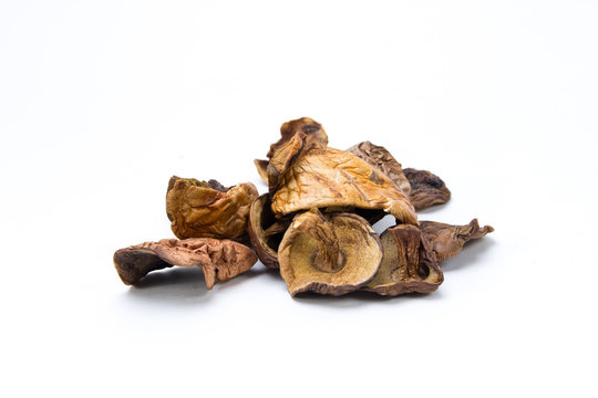 Dried mushrooms on a white background closeup. Boletus, orange-cap boletus.