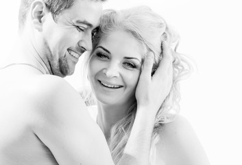 Fototapeta premium Beautiful couple in love embraces, nude