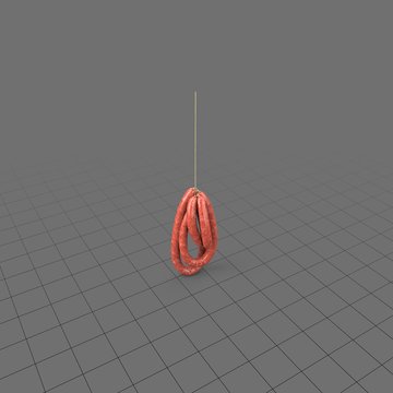 Long sausages hanging from string