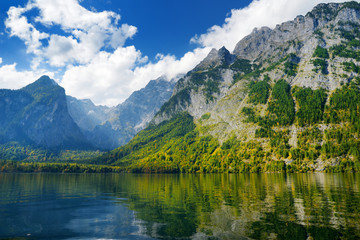 Fototapeta na wymiar Stunning deep green waters of Konigssee, known as Germany's deepest and cleanest lake, located in the extreme southeast Berchtesgadener Land district of Bavaria