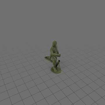 Green plastic soldier with mortar