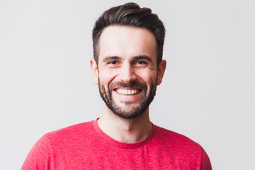 Obraz premium Portrait of a handsome young man smiling