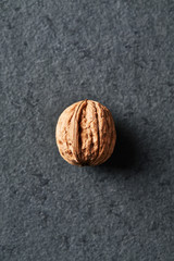 Walnut on a stone background; close up