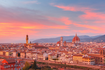 Fototapeta na wymiar Duomo Santa Maria Del Fiore and tower of Palazzo Vecchio at gorgeous sunset from Piazzale Michelangelo in Florence, Tuscany, Italy