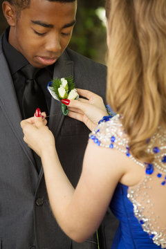 Young teens getting ready for the prom.